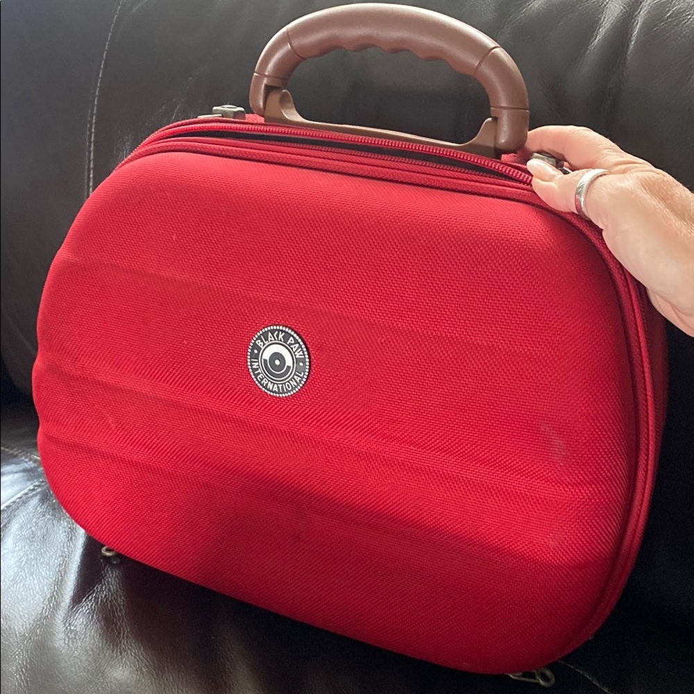 Red and Brown Travel Bag with Glossy Finish and Ribbed Texture